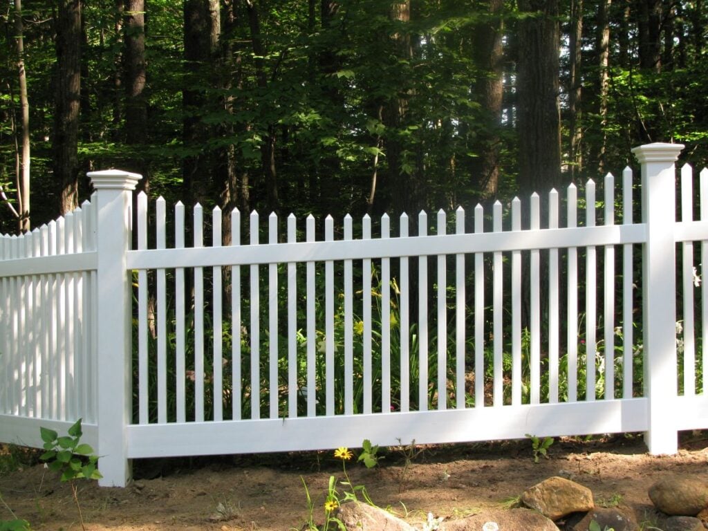 White vinyl picket fence
