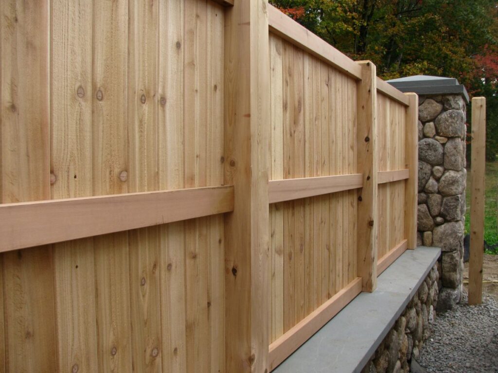 Wood cedar on stone knee wall