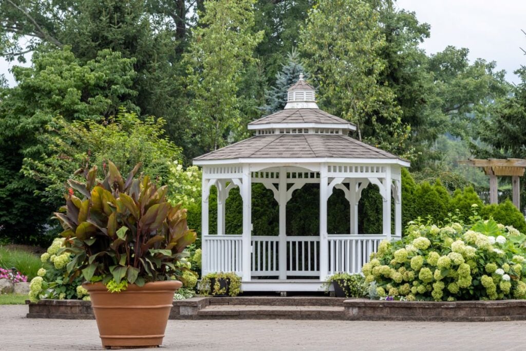 backyard pergola ideas white old style next to garden