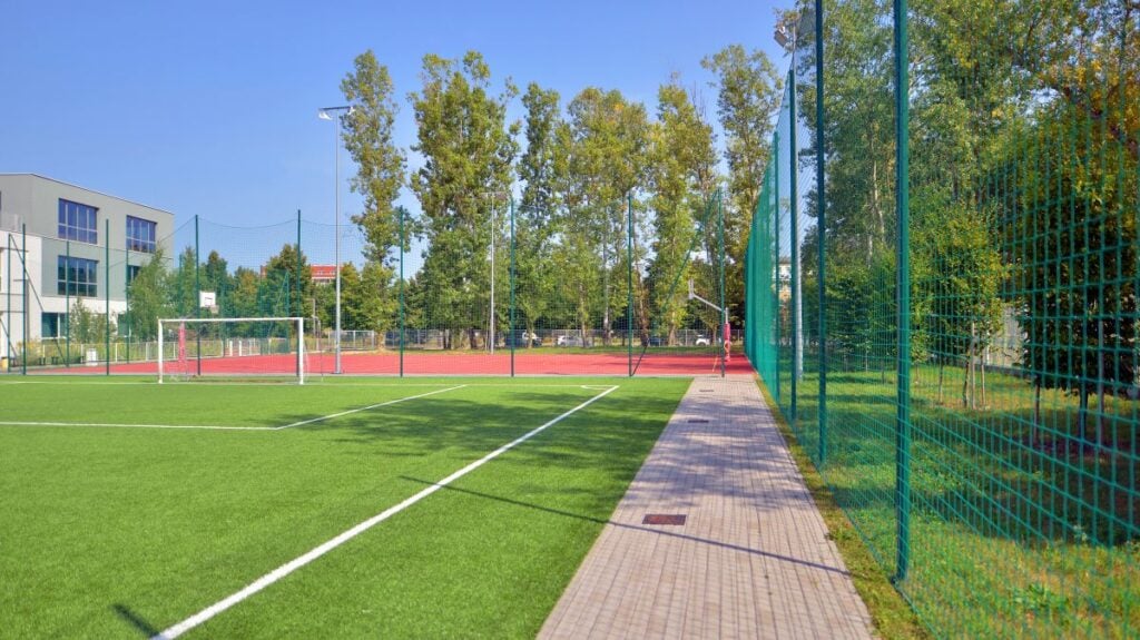 Chainlink fence surrounding a school yard