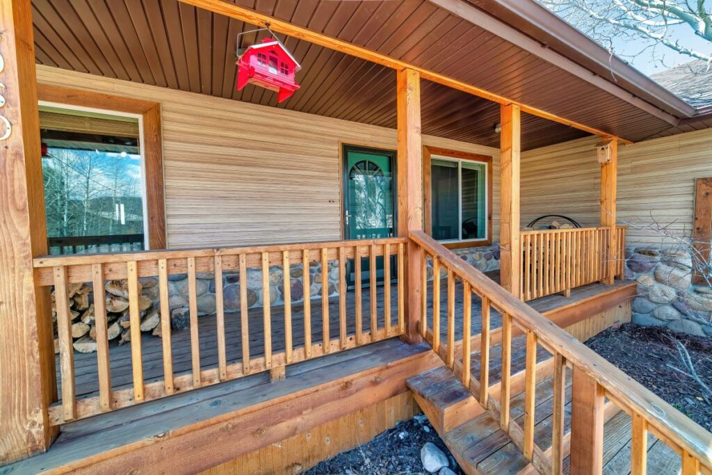 Facade of home with stairs open porch