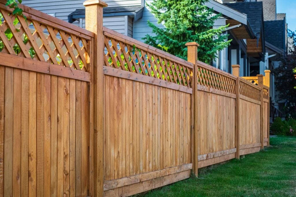 Nice new wooden fence around house
